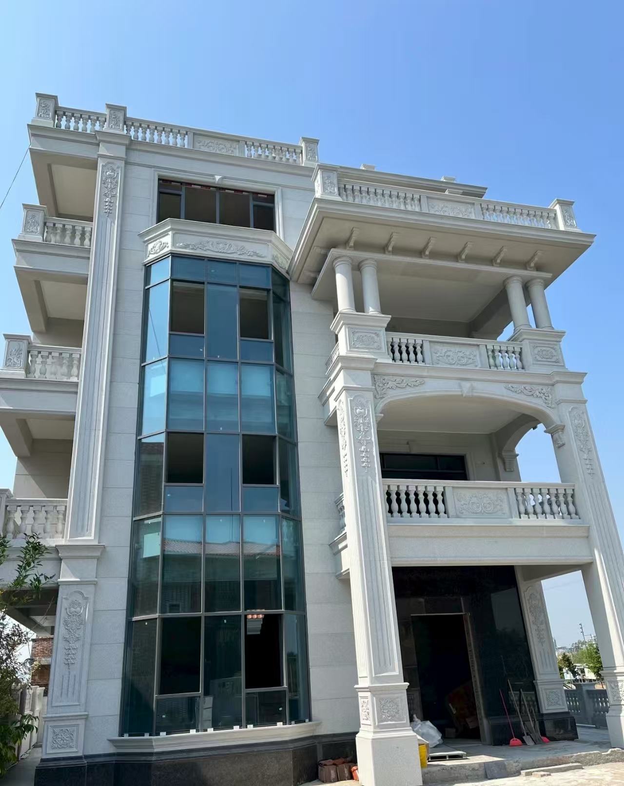 泸州 白麻花岗岩别墅外墙干挂效果展示