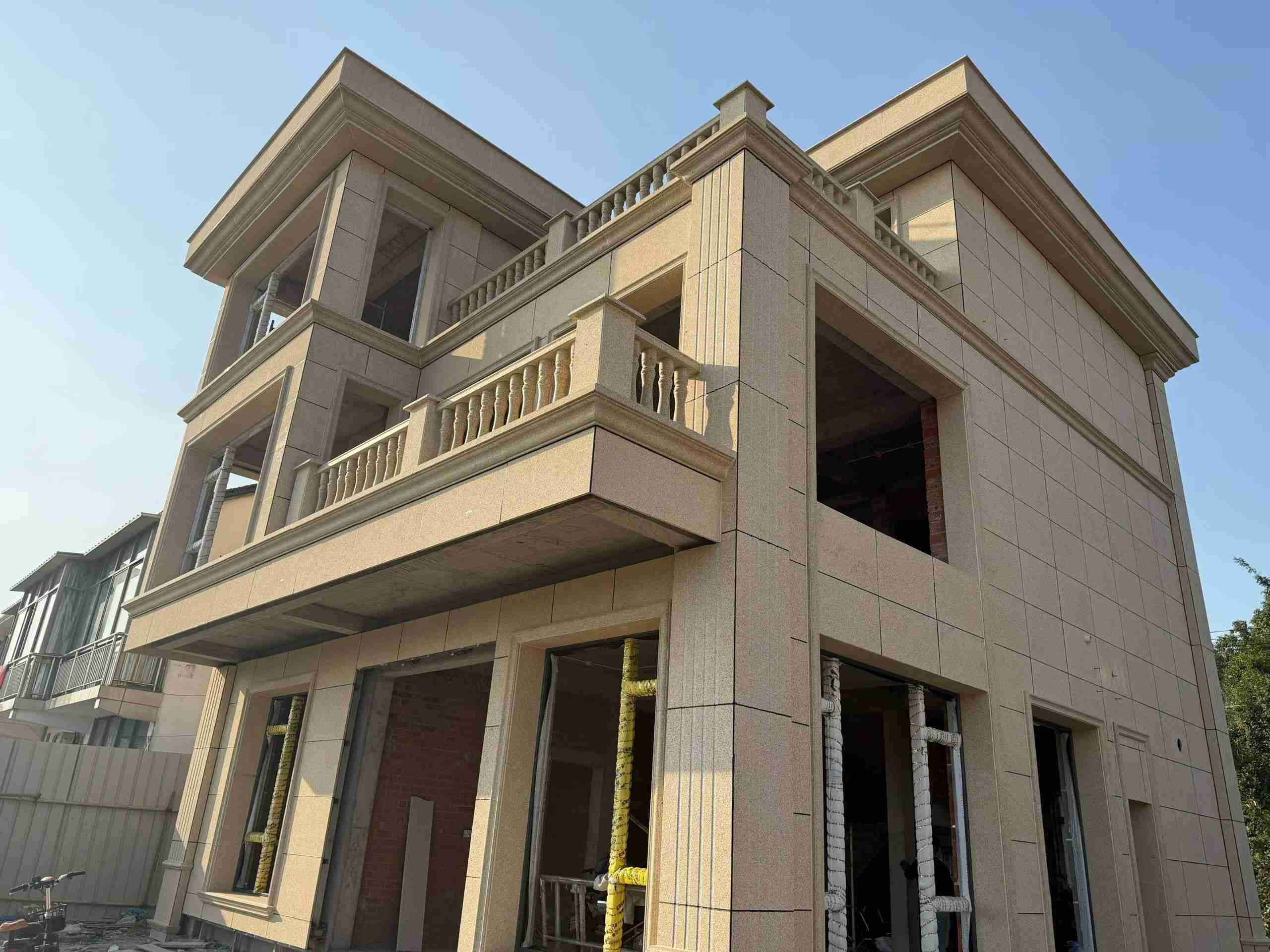 泸州 黄金麻花岗岩石材荔枝面外墙干挂效果展示