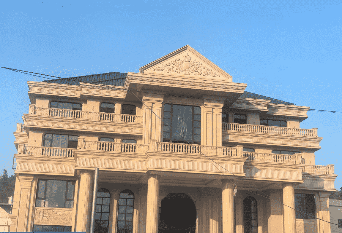 泸州黄金麻别墅外墙干挂石材效果示例